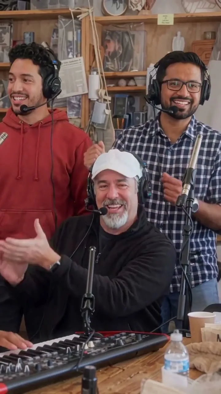 Friends casting idea: an AI band behind an office desk